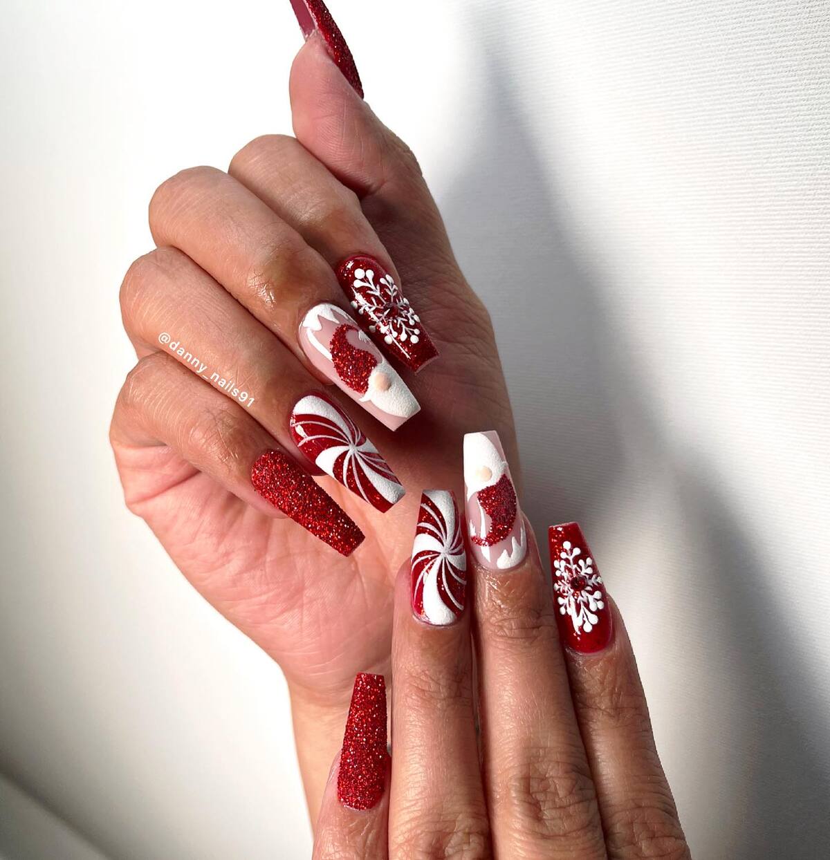 33. Sparkling Red and White Christmas Acrylic Nails