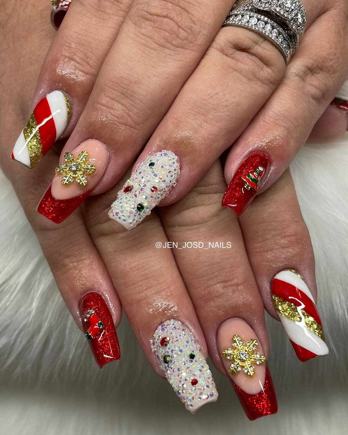 6. Glamorous Christmas Acrylic Nails with Golden Sparkle