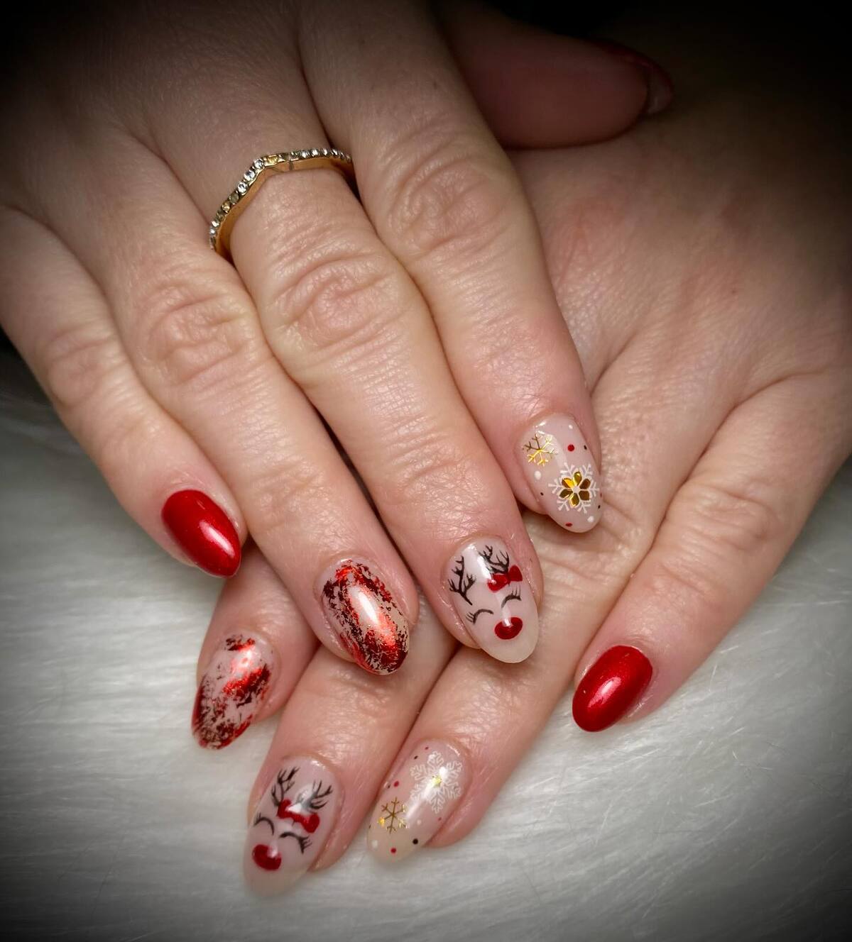 10. Rudolph-Inspired Christmas Oval Nails