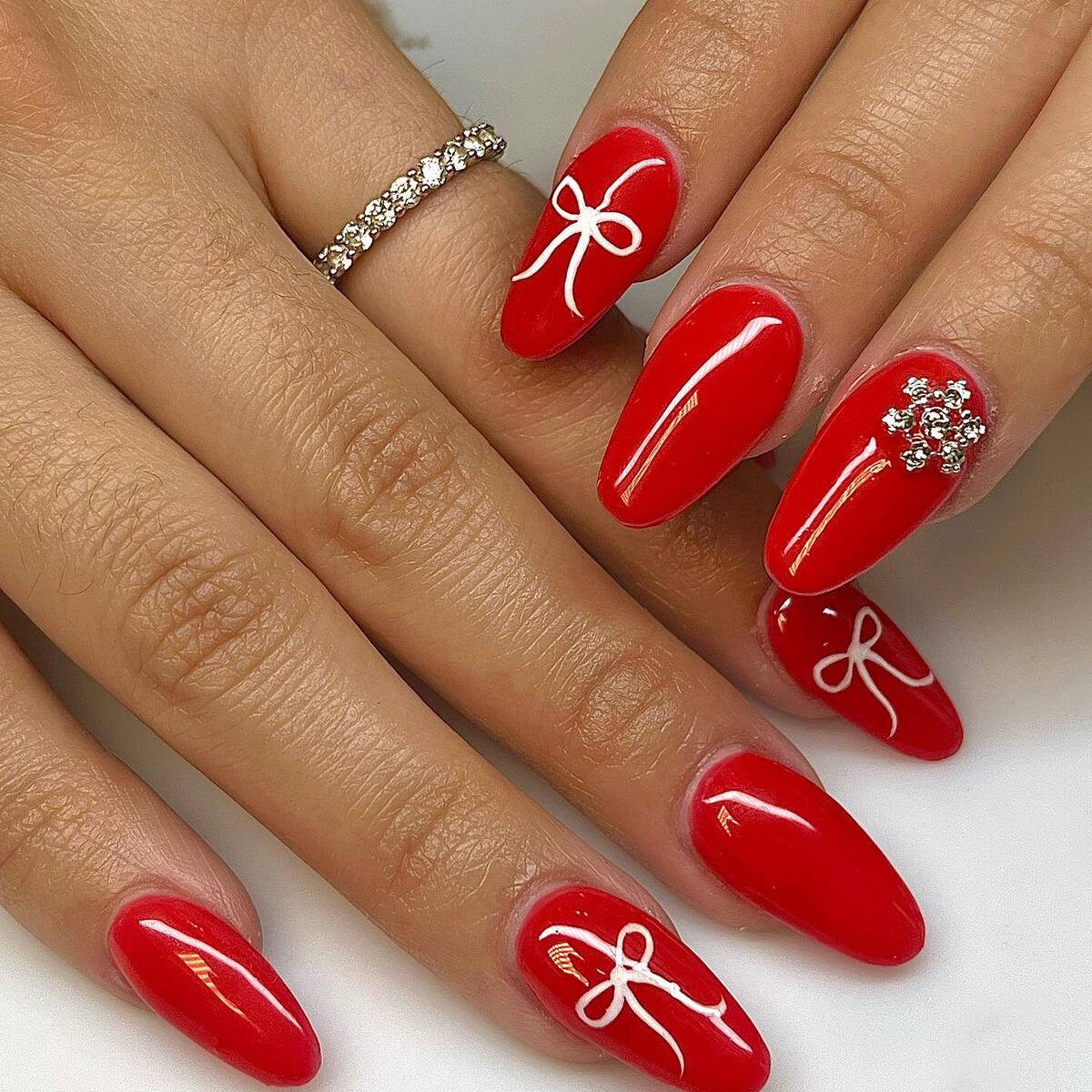 7. Christmas Gift-Inspired Oval Nails