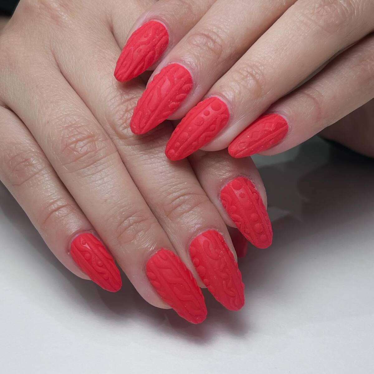 14. Bold Red Sweater Knit Nails