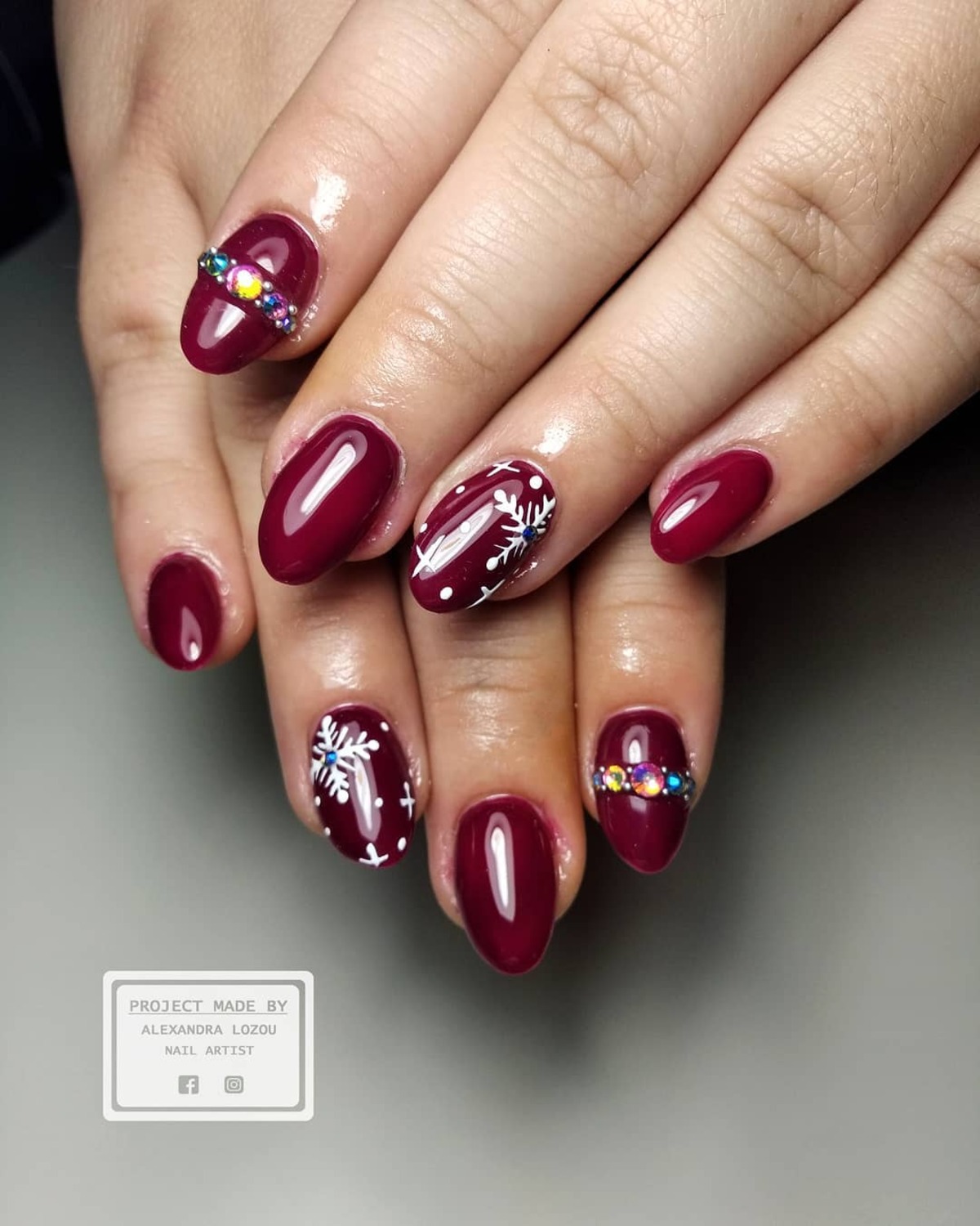 22. Festive Burgundy Glow with Crystal Snowflakes