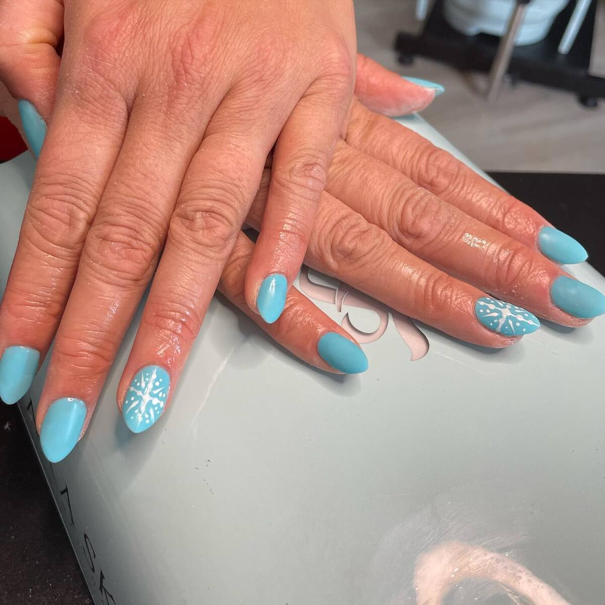 25. Simple Snowflake Charm